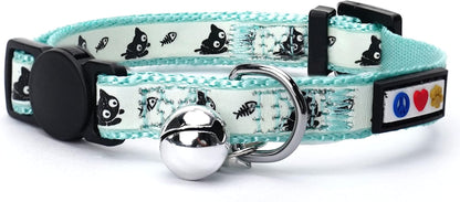 Cat collar with bell and paw print design on a white background