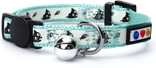 Cat collar with bell and paw print design on a white background